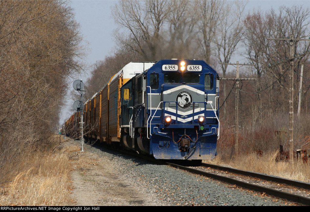 Z127 slowly pulls down toward the diamond after CN cross traffic cleared